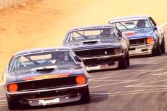 Dan Gurney leading Swede Savage and Mark Donahue 