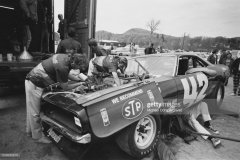Mechanics at work on the Plymouth Barracuda to be driven by Swede Savage of All American Racers, ahead of Round 2 of the 1970 Trans-American Sedan Championship, held at the Lime Rock Park circuit in Lakeville, Connecticut, 9th May 1970. (Photo by Michael Fredericks Jr/Pix/Michael Ochs Archives/Getty Images)